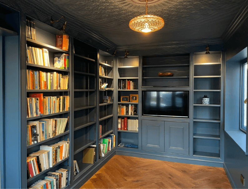 Built-in library shelving and cabinetry in Surbiton, Surrey, showcasing fine carpentry